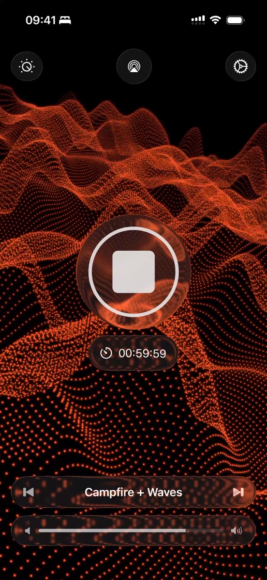 Feu de camp et Vagues en lecture avec le visualiseur orange et un minuteur de sommeil qui décompte à partir d’une heure